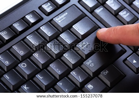 Hands of businessman with a computer keyboard.