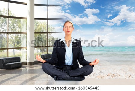 Meditation. Relaxing business woman on the beach