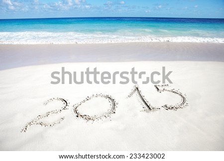 Inscription on the sand 2015. Happy holidays