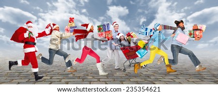 Group of Happy people running with Xmas gifts. Christmas.