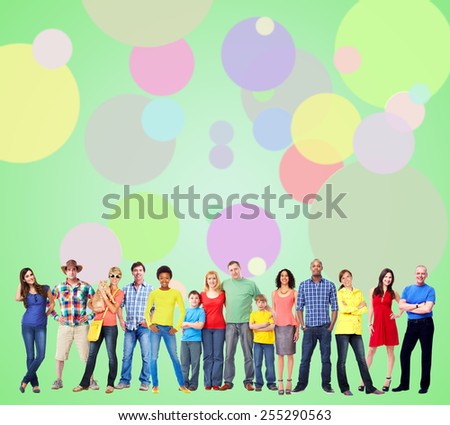 Large smiling People group near colorful background.