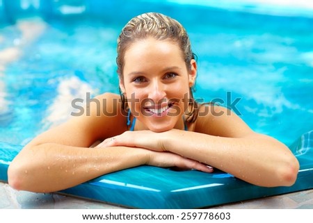 Young woman relaxing in hot tub. Summer vacation.