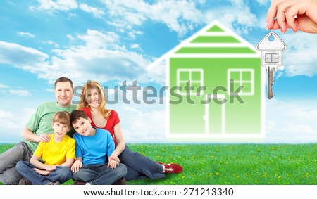 Happy family near new house. Real estate background.