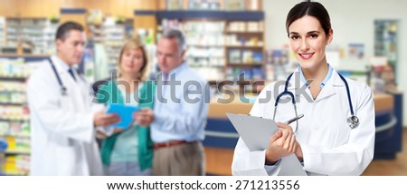 Medical physician doctor  woman over pharmacy background.