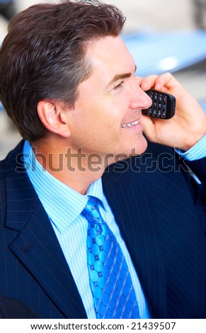 Businessman calling by cellular