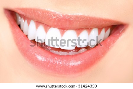 Beautiful young woman teeth. Close up