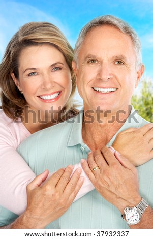 Happy elderly couple in love in park
