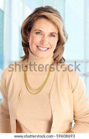 Smiling business woman. Over blue background