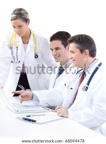 Smiling medical doctors working with a computer. Isolated over white background
