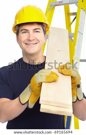 Handsome builder with wood planks. Isolated over white background