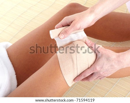 Knee joint  pain. Bandage