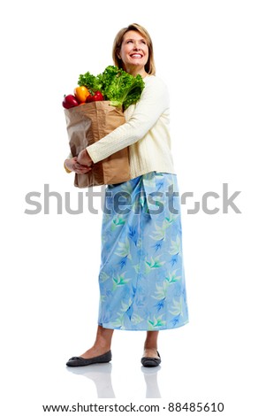 Senior shopping woman with grocery items . Isolated over white background.