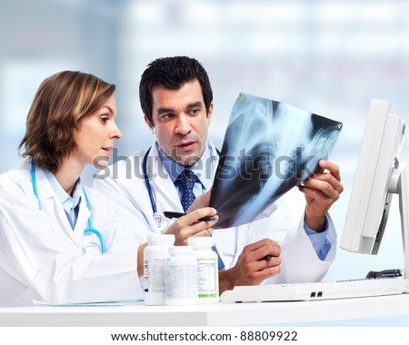Doctors team with x-ray. Health care. Radiology.