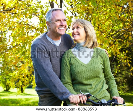 Happy senior couple in love in the park.