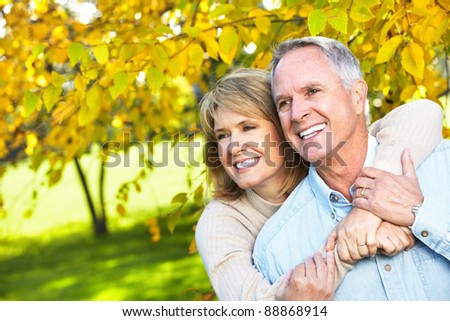 Happy senior couple in love in the park.