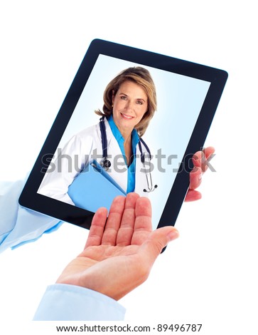 Tablet computer and doctor woman. Health care. Isolated on white background.