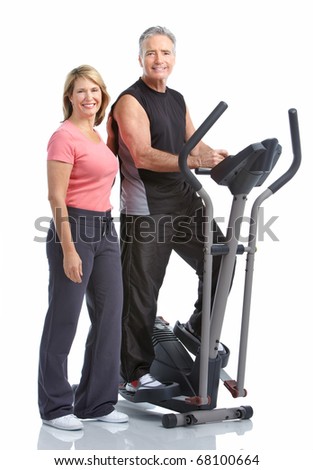 Gym & Fitness. Smiling elderly couple working out. Isolated over white background Foto stock © 