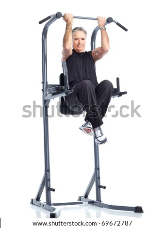 Gym & Fitness. Smiling elderly man  working out. Isolated over white background Foto stock © 
