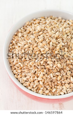 pearl barley in red bowl