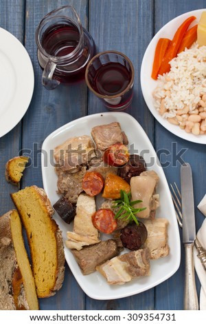 portuguese food on blue wooden background