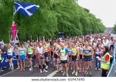 EDINBURGH, SCOTLAND, UK - MAY 23: Group of runners starts  the Edinburgh Marathon , May 23, 2010 in Edinburgh, UK