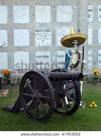 MEXICO CITY - NOVEMBER 2: works in cardboard, wood and metal offerings to the heroes of the Mexican Revolution in the cemetery of San Fernando. November 2, 2010. Mexico City