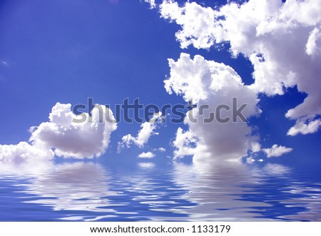 Bright Blue Sky and Puffy White Clouds Reflected in Water  - SEE MORE IN MY GALLERY