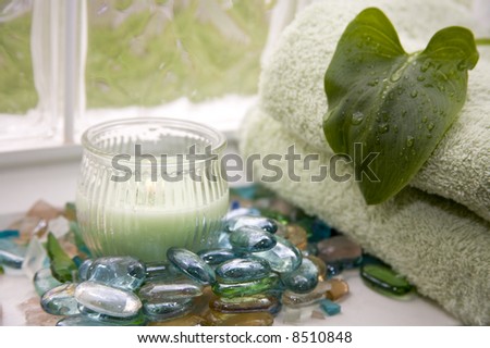 Spa Retreat with Towels, Candles, and Healing Stones