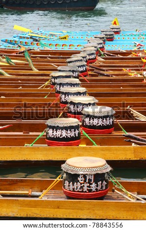 HONG KONG - JUN 6: The dragon boat stays along the rive after finished the dragon boat race on Tuen Ng Festival on June 6, 2011 in Tuen Mun, Hong Kong.
