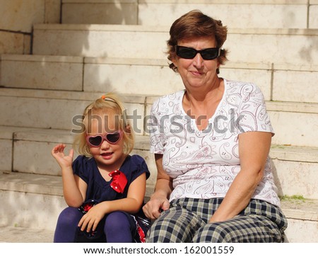 Happy Grandma With Grandchild