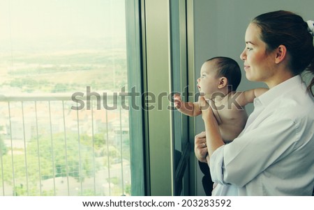 young mother with her 6 month old  baby