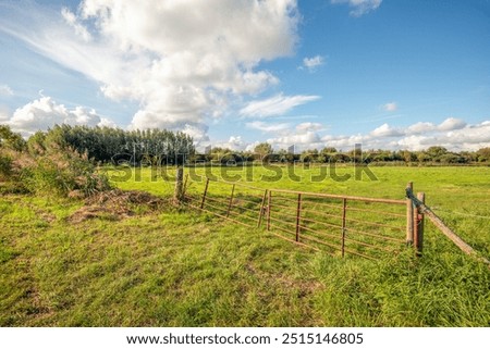 Similar – Image, Stock Photo Wooden gate between two houses with no trespassing sign.