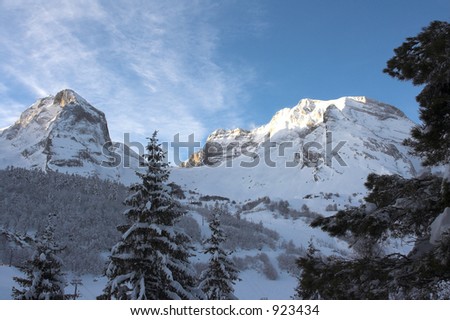 sun on snow mountains