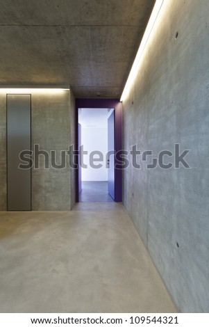 door of entry a flat, corridor, concrete wall