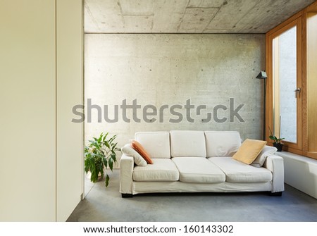 beautiful modern house in cement, interiors, room with divan
