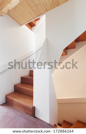 comfortable empty loft, interior, wooden staircase