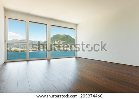 modern house, empty room with window overlooking the lake