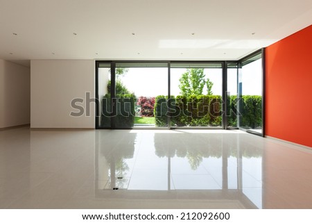 Interior modern villa, wide living room with windows