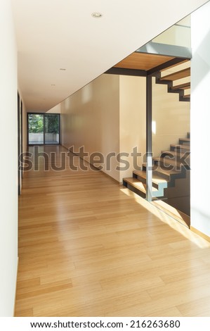 entrance of a modern house, corridor and stairs view