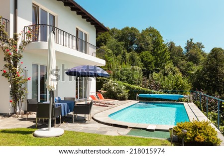 Nice terrace with swimming pool in a house