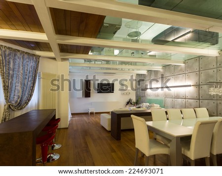 Architecture, wide loft with modern furniture, dining room