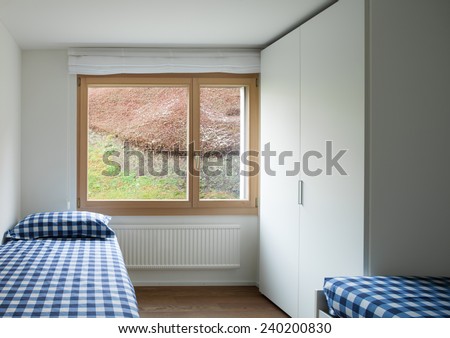 Architecture, modern apartment, empty bedroom with two single beds and closet