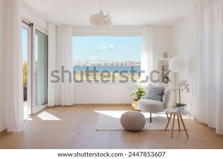 Similar – Foto Bild Moderne Zimmereinrichtung mit Kissen auf Teppich zu Hause