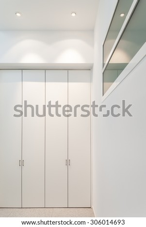 interior of a modern building, detail corridor with closets