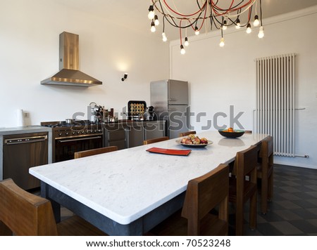 nice apartment refitted, kitchen view with appliances in style