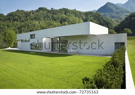 outdoors modern house with green garden