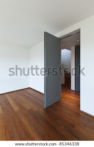 Modern apartment, empty room with door open