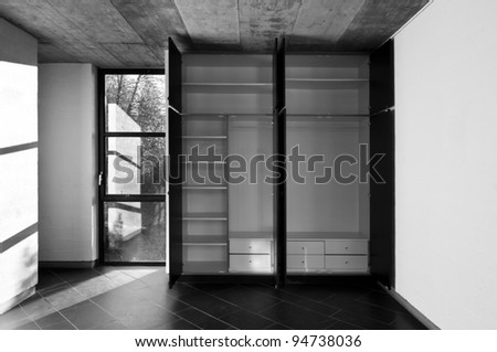interior room,closet doors open, black and white,