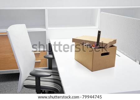 Empty desk after termination of employment - landscape interior.