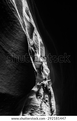 Girl Backpacker Climbing Spooky Gulch Short Canyon Grand Staircase-Escalante Black and White